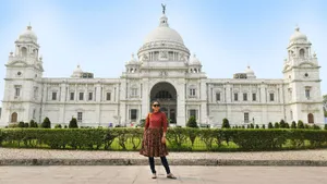 Here's our host being all tourist-y and posing in front of the iconic Victoria Memorial in Kolkata.