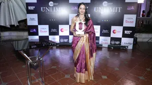 Uma Raghuraman, popularly known as Masterchef Mom, posing with her Best Digital Food Influencer award.